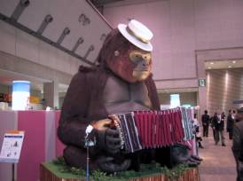 A giant gorilla playing a bandonion